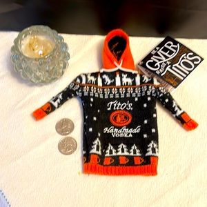 Tito’s Vodka (whimsical) bottle decoration, comes  w/2 holiday beverage recipes.